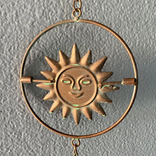 Load image into Gallery viewer, Iron Kinetic Rotating Sun Face Wall Chain
