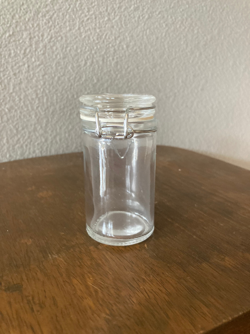 Small glass apothecary jar