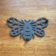 Load image into Gallery viewer, Cast Iron Black Bee Trivet
