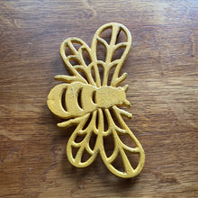 Load image into Gallery viewer, Cast Iron Yellow Bee Trivet
